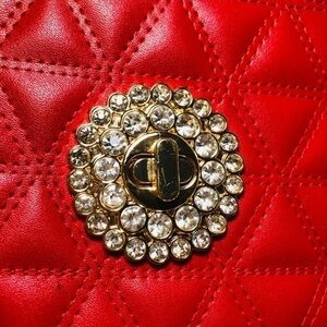 Red evening bag. Long gold strap